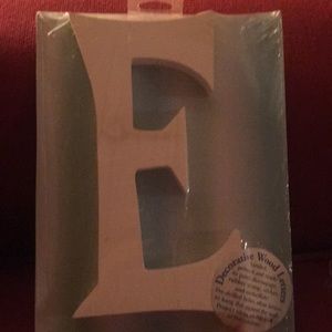 Decorative wood letters letters “E” and “C”